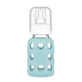 lifefactory 4 oz mint glass baby bottle made of borosilicate glass & a medical grade silicon sleeve. bpa & bps free