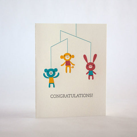 fugu fugu press congrats mobile 181 letterpress card printed on recycled paper. inside of the card is blank. made in the usa