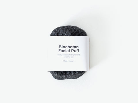 binchotan charcoal facial puff made from a blend of micro-fine binchotan charcoal powder and pure konjac vegetable fibers