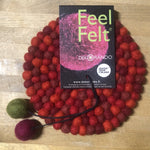 feel felt, felted wool 5 1/2" diameter trivet, red