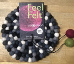 feel felt, felted wool 5 1/2" diameter trivet, black & white