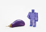 areaware violet small cubebot is a robot toy that can be assembled into countless poses and folds up into a cube