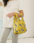 baby baggu ochre zebra reusable shopping bag holds up to 50lbs. made from 40% recycled ripstop nylon