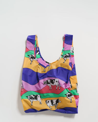 grazing cows standard baggu reusable shopping bag holds up to 50lbs. can fit over shoulder. made from 40% recycled ripstop nylon