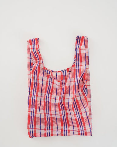 market red standard baggu reusable shopping bag holds up to 50lbs. can fit over shoulder. made from 40% recycled ripstop nylon