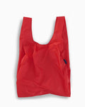 red standard baggu reusable shopping bag holds up to 50lbs. can fit over shoulder. made from 40% recycled ripstop nylon
