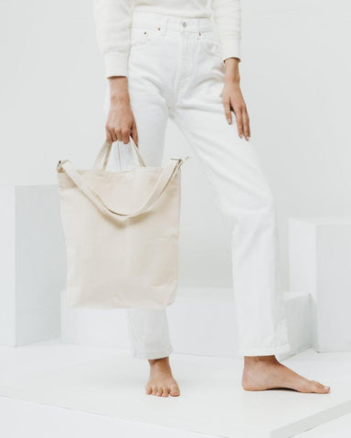 baggu canvas duck bag is made from 65% recycled cotton canvas machine wash or hand wash cold, line dry