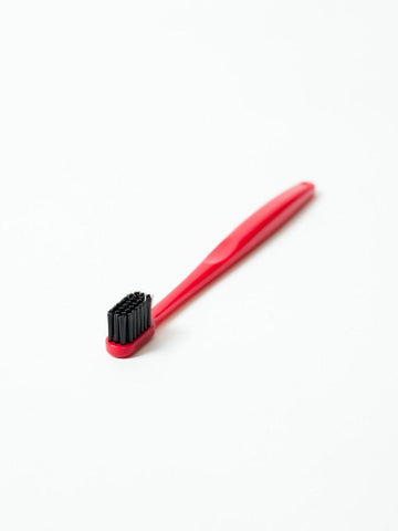 charcoal toothbrush, red