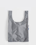 grey standard baggu reusable shopping bag holds up to 50lbs. can fit over shoulder. made from 40% recycled ripstop nylon