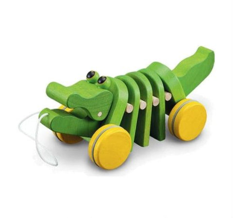 plan toys dancking alligator 1501 moves wave-producing rhythmic 'click-clack' sounds. Suitable for crawlers and early walkers