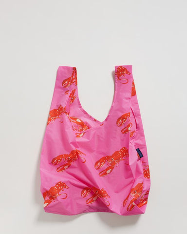 standard baggu pink lobster reusable shopping bag holds up to 50lbs. can fit over shoulder. made from 40% recycled ripstock nylon 