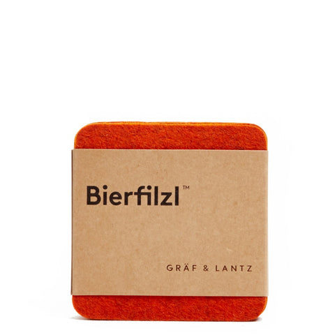graf lantz colorful orange felted wool coasters. made in CA USA
