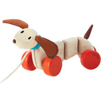 plan toys happy puppy wiggles and waggles and turns it's head when pulled. sustainable wood