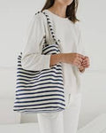 baggu sailor stripe duck bag is made from 65% recycled cotton canvas machine wash or hand wash cold, line dry