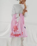 standard baggu thank you rose reusable shopping bag holds up to 50lbs. made from 40% recycled ripstop nylon