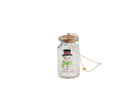 tiny snowman ornament is hand–painted by artisans. handmade in peru