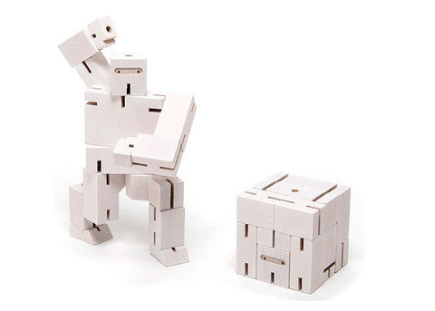 areaware white ninja micro cubebot is a robot toy that can be assembled into countless poses and folds up into a cube